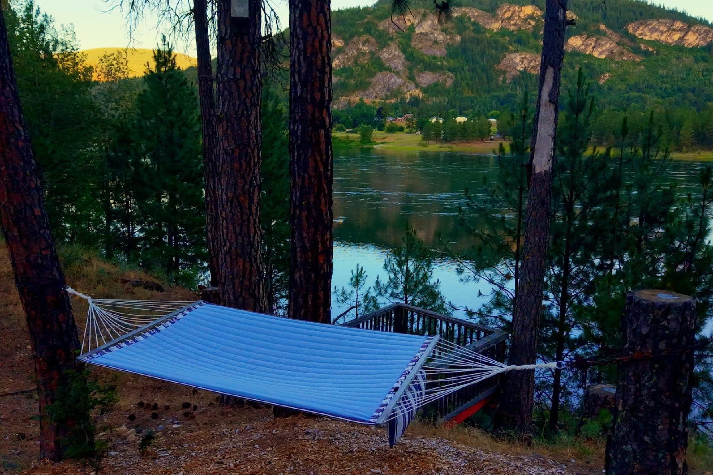 Hammock by the serene riverside view.