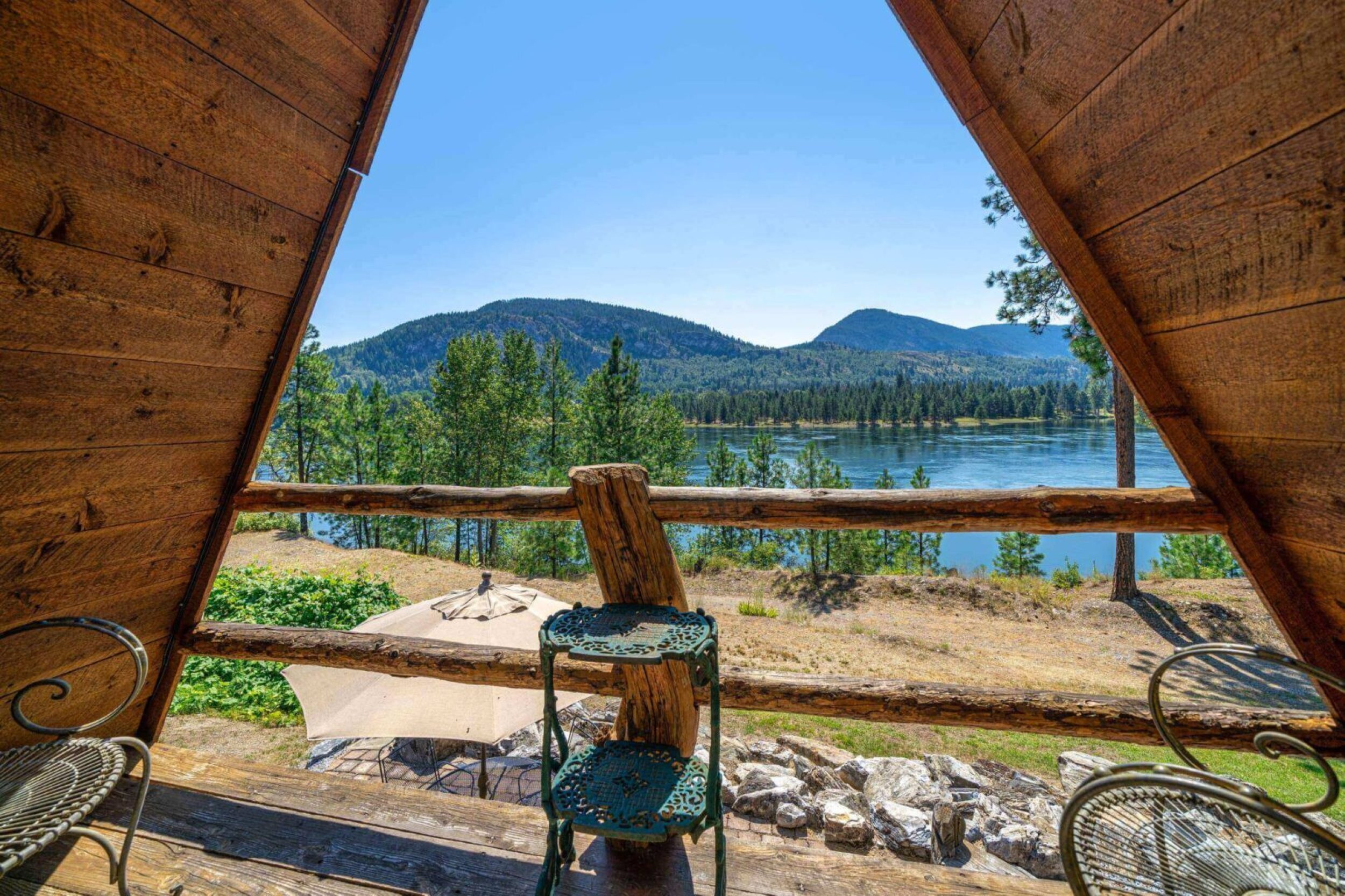 A-frame cabin with scenic lake view.